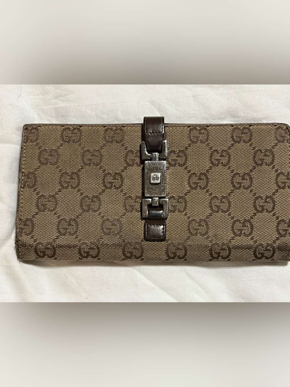 Gucci Brown Monogram Continental Wallet
G-12
